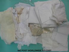 A quantity of Edwardian lace collars and cuffs together with a small collection of pillow cases and