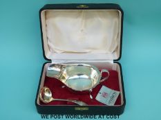 A boxed Viners hallmarked silver sauce boat and ladle,