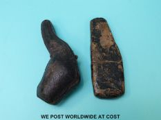 A Meerschaum pipe in the form of a hand in a hat,