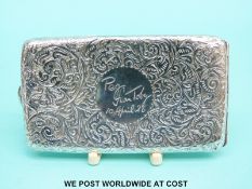 A Victorian hallmarked silver card or cigarette case of sprung design, Birmingham 1890,