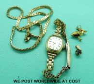 A yellow metal necklace marked 375 (14.