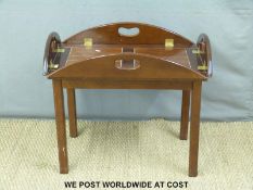 A mahogany butler's tray on stand