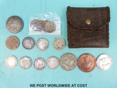 A small collection of coins including Victorian half crown, four George V farthings with lustre,