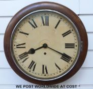 A late 19th early or 20th century English dial clock with painted Roman dial and spade hands,