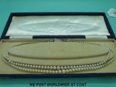 A double strand of pearls with 9ct white gold clasp.