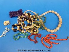 A collection of beads to include agate,