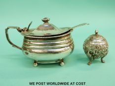 A Georgian hallmarked silver lidded mustard with blue glass liner,