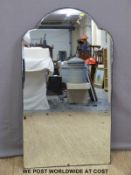 A retro 1950s shaped mirror with bevelled edge (H107 x W66cm)