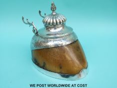 A hallmarked silver mounted horse's hoof inkwell and pen holder with military inscription 