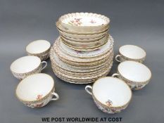 A Dresden six place setting tea set with floral and gilt decoration