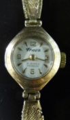 Traez 9ct gold ladies wristwatch with gold hands and markers and N K Co case, on 9ct bracelet,