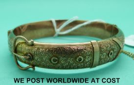 A 9ct gold bangle in the form of a buckle, Birmingham 1914 (17.