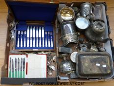 A collection of plated ware including wine coaster, cruet,