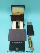 A cased Dunhill Rollagas lighter with enamel panels,