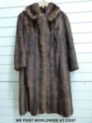 A fur coat by Alfred Bazar and Son Ltd.