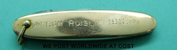 A yellow metal pocket knife marked 15ct 'From Ruislip 1912'