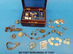 A quantity of white metal filigree jewellery, white metal earrings, silver charms,