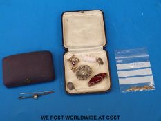 A yellow metal bar brooch marked 9ct, Edwardian pendant set with an amethyst and seed pearls,