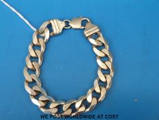 A heavy curb link bracelet marked 925