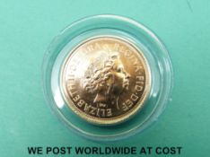 Royal Mint 2010 gold half sovereign in original sleeve pack box