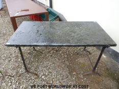 A steel and marble effect table (H77cm x W138cm x D73cm)