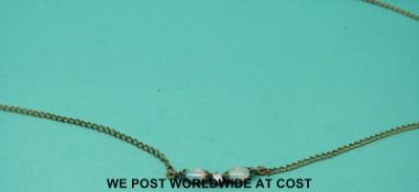 A 9ct gold necklace set with opals and a diamond