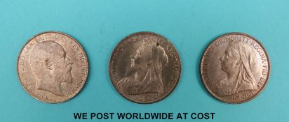 Two 1901 Victorian veiled head pennies together with an Edward VII 1902 example,