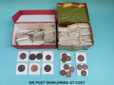 A collection of catalogued pennies and halfpennies,