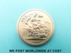 A 1965 Elizabeth II first head gold full sovereign