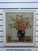 A framed tapestry of a Buddha sitting under a vase of Chinese lanterns