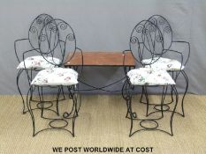 Four garden chairs with cushions and a matching table with cushions.