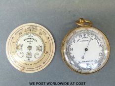 A compensated pocket barometer and an early 20thC ivorine weather forecasting calculator.