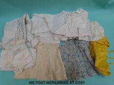 A quantity of Victorian baby clothing to include two day gowns, two night gowns and two petticoats.