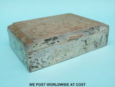 A hallmarked silver Art Deco style engine-turned cigarette box,