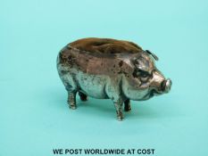 An Edward VII hallmarked silver novelty pin cushion formed as a pig, Birmingham 1904,