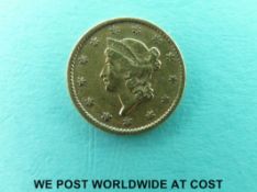 An American gold dollar 1853 1.