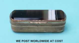 A double sided banded agate gilt metal vesta with hinged strike within, length 5.