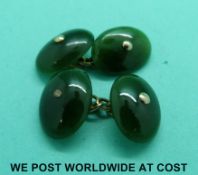 A pair of jadeite cufflinks