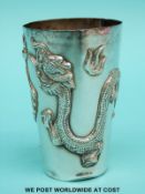 Chinese white metal beaker decorated with a dragon, seal mark to base, height 7.
