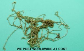 A quantity of 9ct gold/yellow metal chains (6g in all)