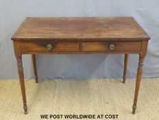 A 19thC possibly fruitwood or mahogany two drawer sidetable or desk,
