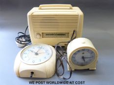 Two white bakelite retro electric clocks, comprising Smiths and Genalex,