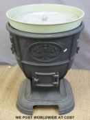 A 10 gallon cast iron Thistle boiler,