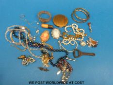 A quantity of costume jewellery to include filigree bracelet, Stratton compact, mizpah brooch etc.