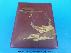 A Japanese lacquer box with costume jewellery