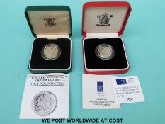 A 1993 silver proof piedfort £1 coin together with a silver proof example,