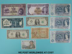 Three circulated UK blue £5 notes,