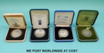 Four silver commemorative crowns 1972, 1980, 1990, and 2000 all cased,