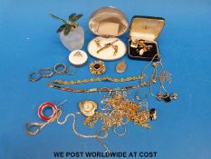 A quantity of costume jewellery to include silver chains and bracelet