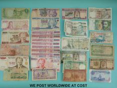 Almost forty circulated world bank notes to include Spain, Australia, Saudi, Hong Kong etc.